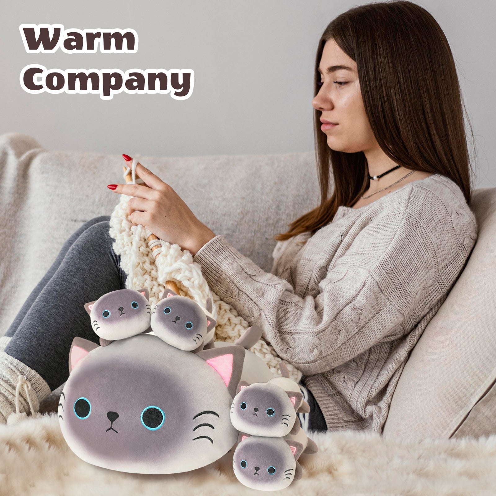 SQEQE Siamese cat stuffed animal with babies held by an adult with the baby plush toys nearby