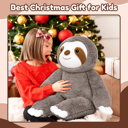 SQEQE giant sloth stuffed animal held by a child near a Christmas tree