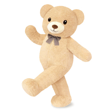 SQEQE giant teddy bear stuffed animal shown in a branded studio product display