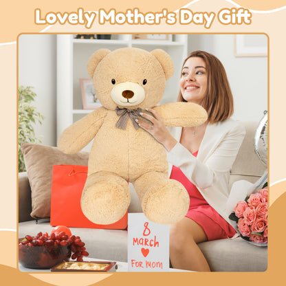 SQEQE giant teddy bear stuffed animal held during a family gift moment