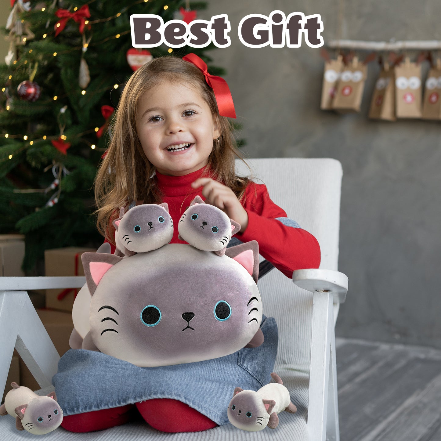 SQEQE Siamese cat stuffed animal with babies opened as a family gift during a holiday moment