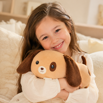 Brown dog stuffed animal displayed alone against a plain background