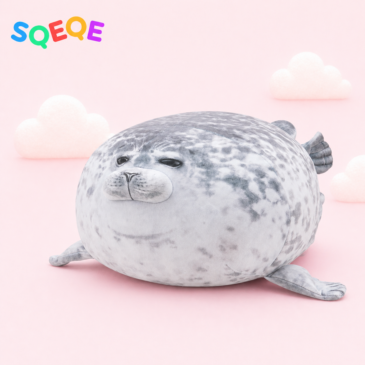 SQEQE weighted seal stuffed animal shown in a branded low profile product display