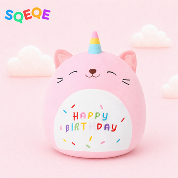 SQEQE birthday cat plush pillow shown in a branded studio product display