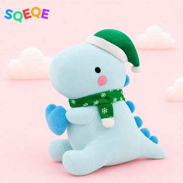 SQEQE Christmas dinosaur stuffed animal shown in a branded holiday studio display