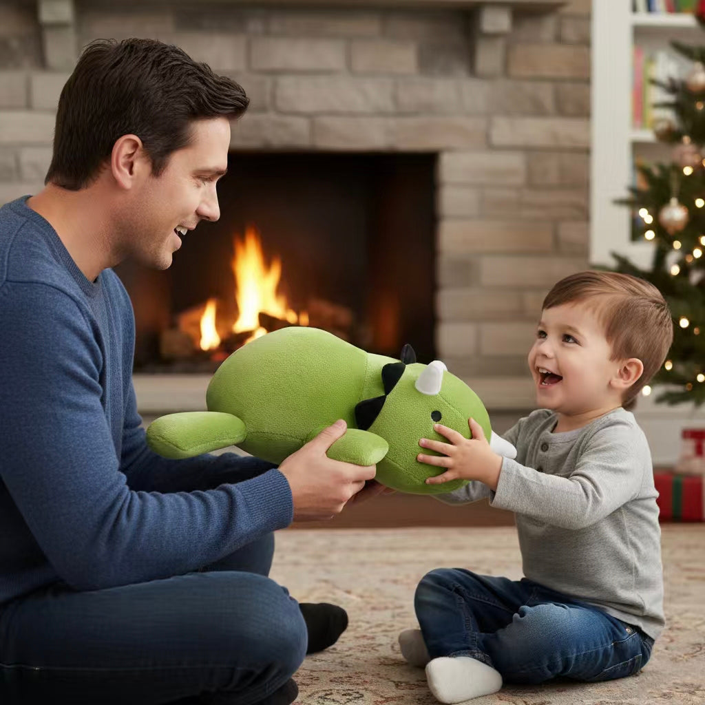 SQEQE giant triceratops stuffed animal shared by an adult and child near a fireplace