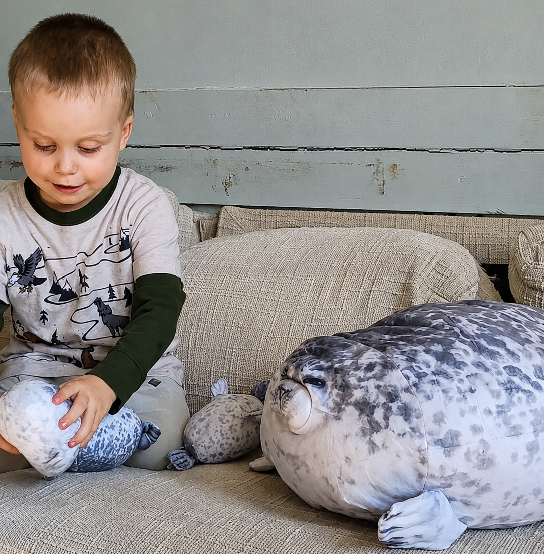 SQEQE seal stuffed animal with babies opened as a family birthday gift