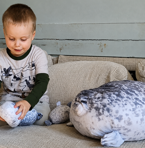 SQEQE seal stuffed animal with babies opened as a family birthday gift